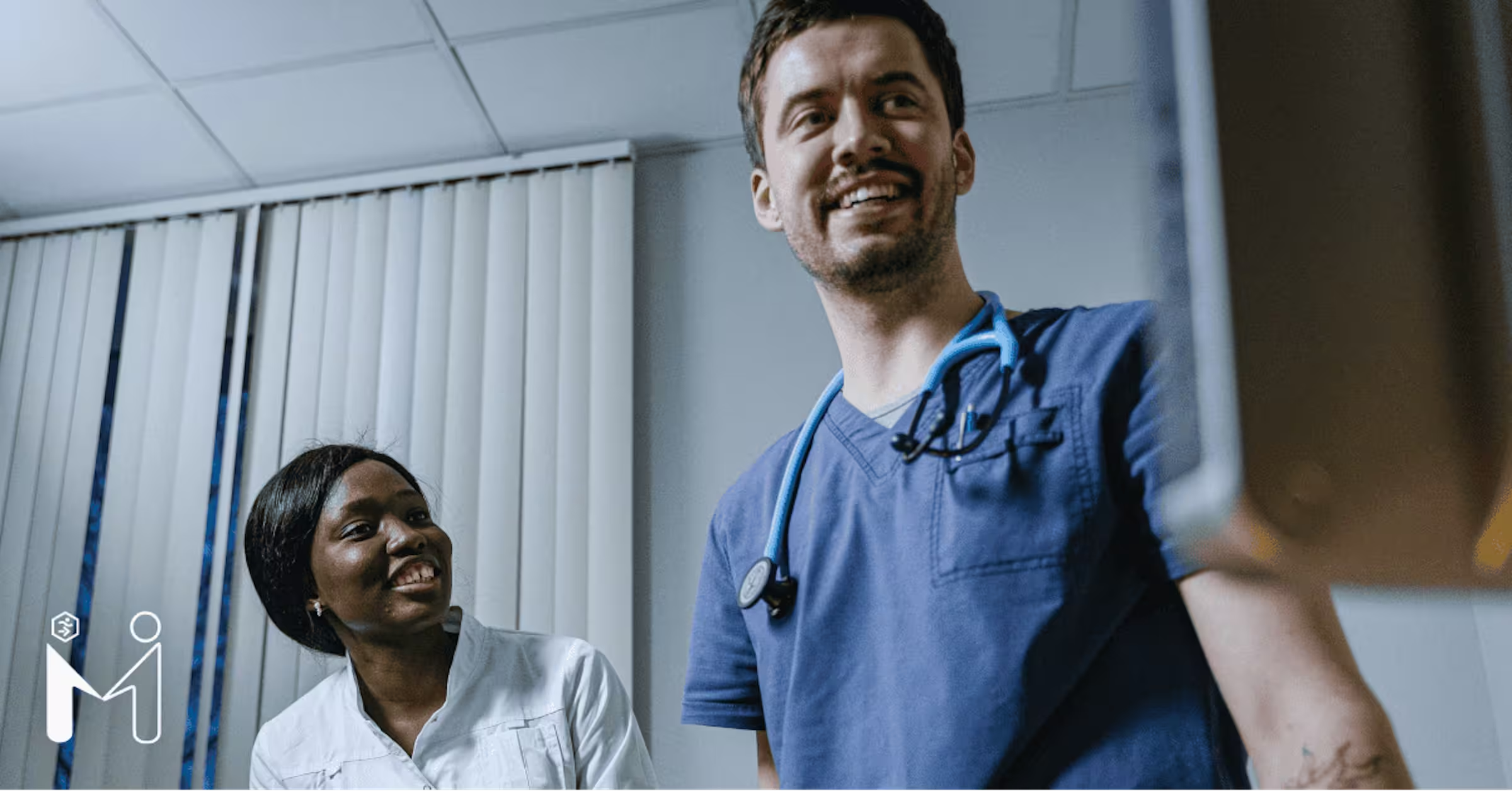 MedForce Health clinician recruitment creative — physician and colleague in a clinic